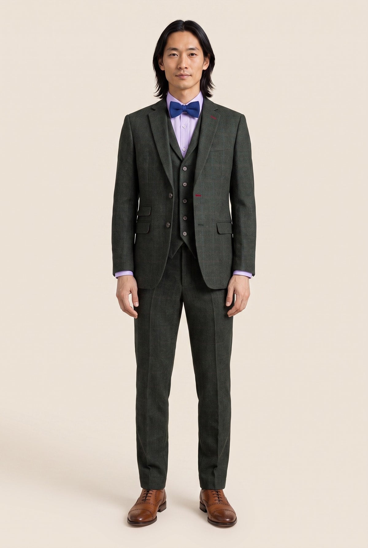 Look #1003 styled with Joshua miesten kolmiosainen vihreä tweedpuku kapealla istuvuudella