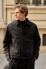 Miesten musta mokkanahkatakki tikatulla vuorauksella ja napitettavalla päällystakilla
