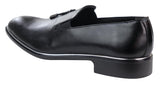 Miesten slip-on-kengät tupsuilla, joissa on metallireunus