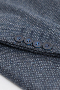 Miesten kolmiosainen laivastonsininen puku kaksirivisellä liivillä